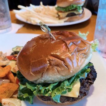 One World Cafe signature dishes The Pile (breakfast dish), Zorba the Greek Sandwich, Gado Gado Salad, Black Bean Burger